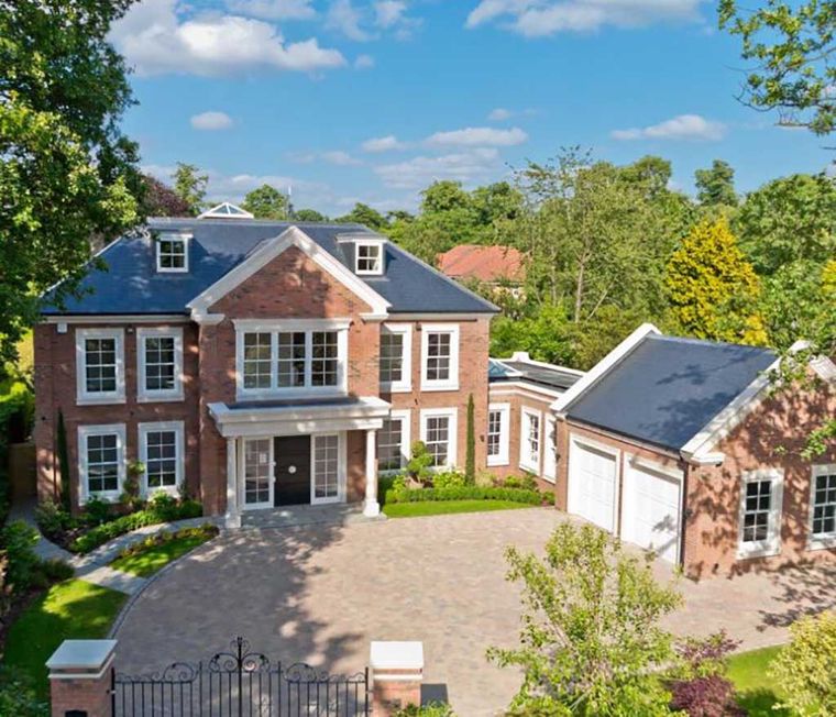 Large detached brick new build house with a double garage